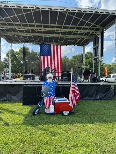The main stage set up with the giant American flag backdrop, ready for the evening's live music